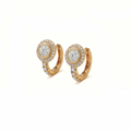 A pair of gold huggie hoop earrings with round diamond clusters, photographed on a clean white background.