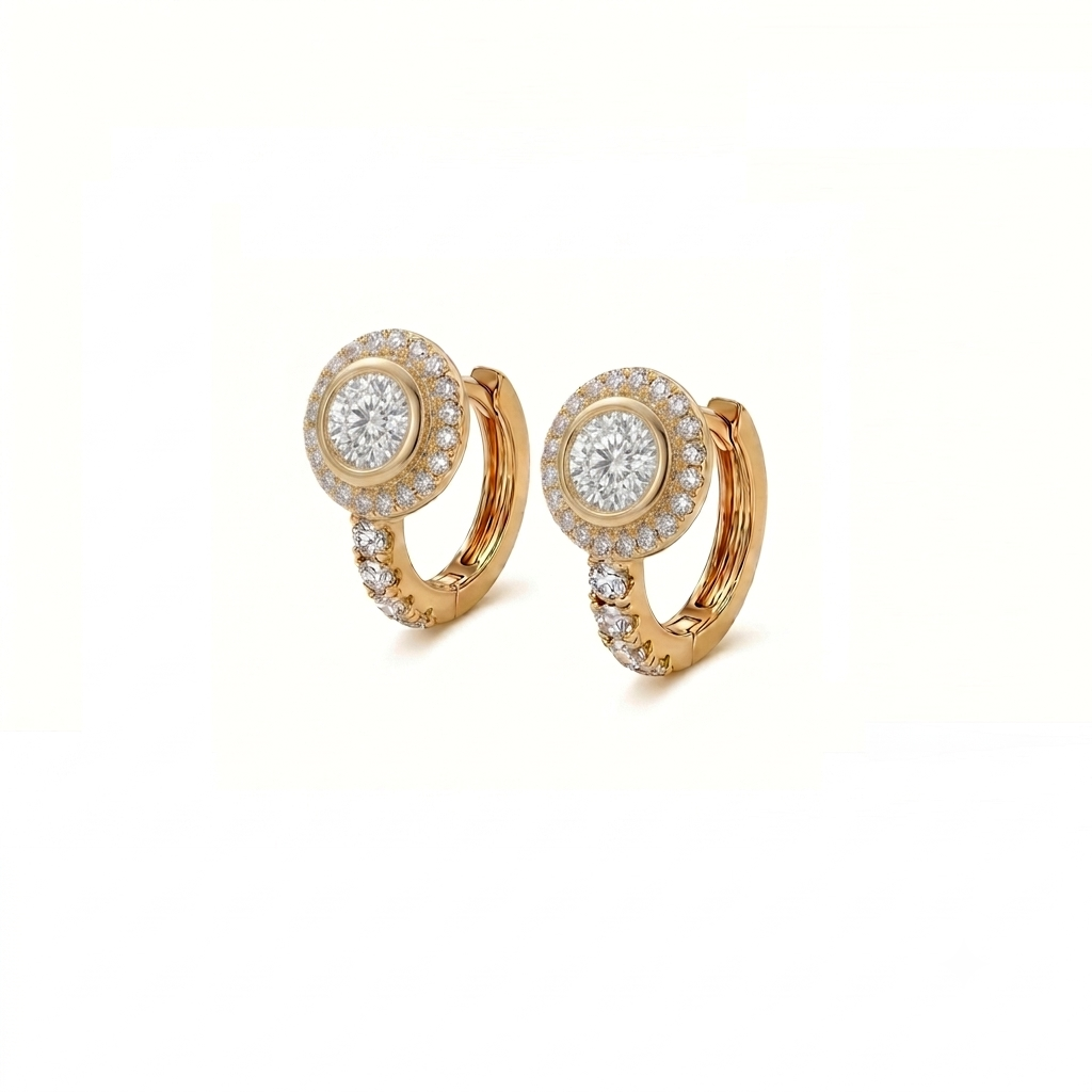 A pair of gold huggie hoop earrings with round diamond clusters, photographed on a clean white background.